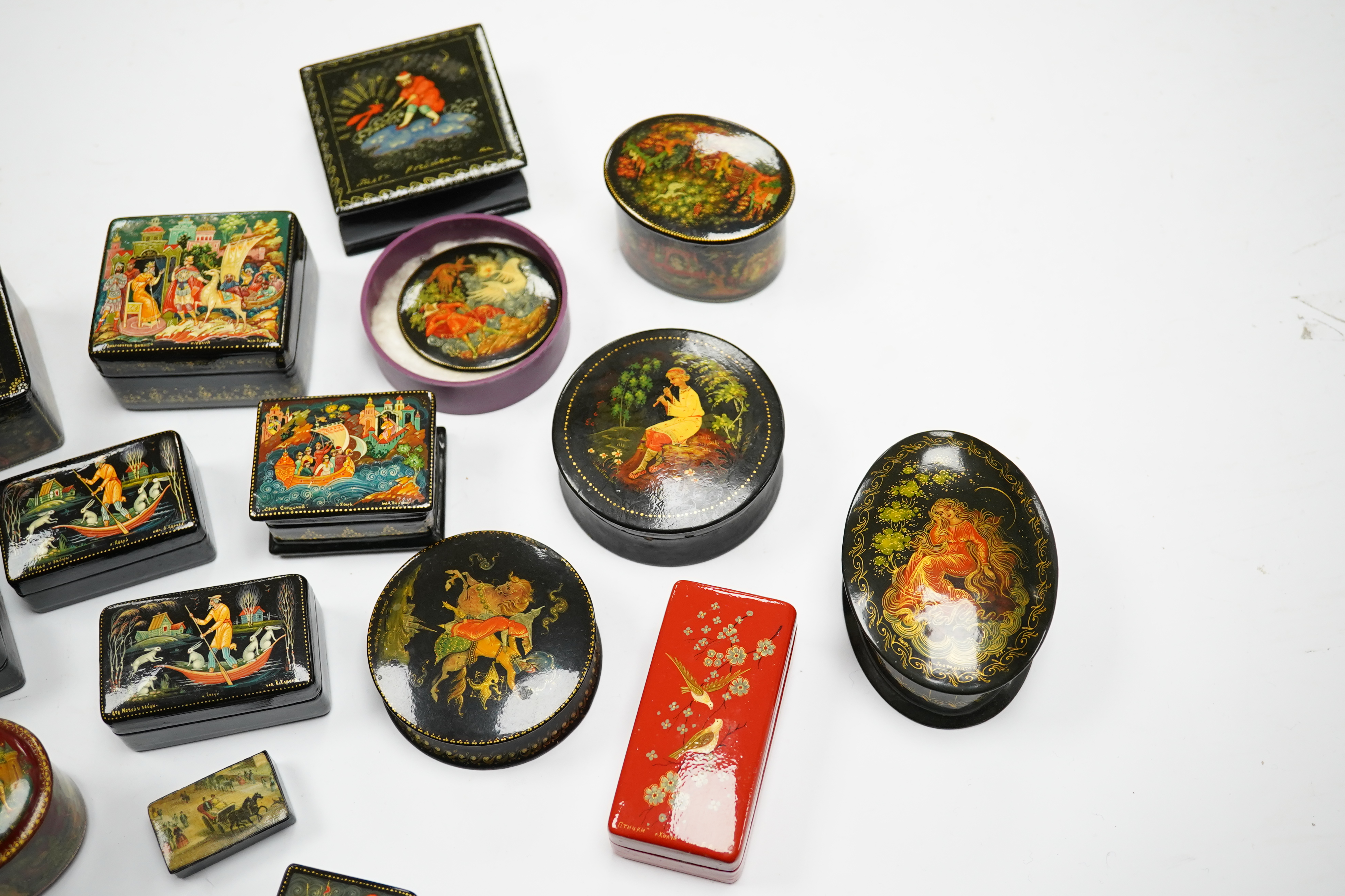 A quantity of late 19th / early 20th century Russian lacquer boxes, largest 9cm. Condition - mostly good